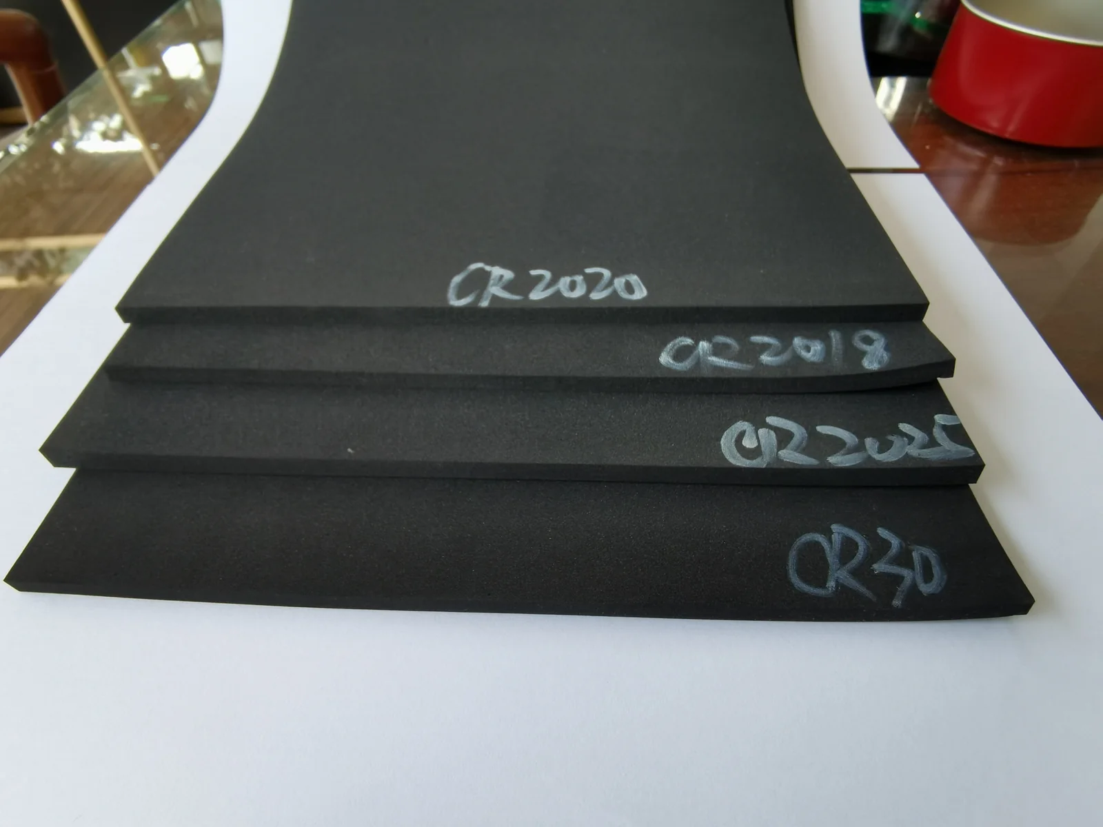 Custom Adhesive-Backed EVA Foam Pads: die-cut EVA profiles, liner construction and protective contact surfaces, view 7