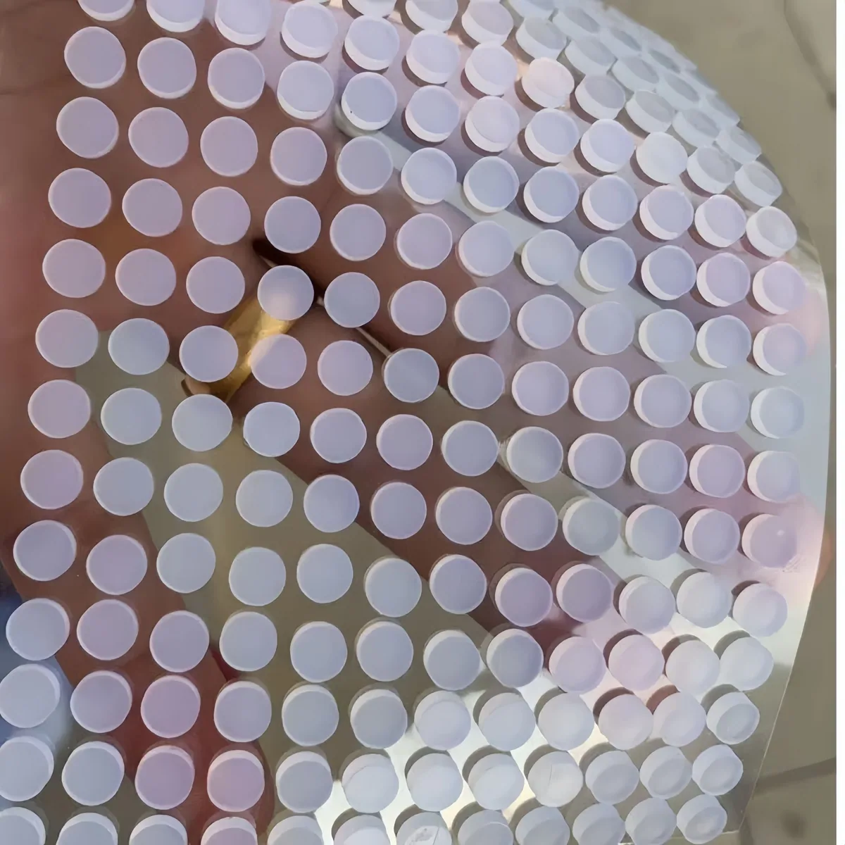 Custom silicone pad with adhesive backing